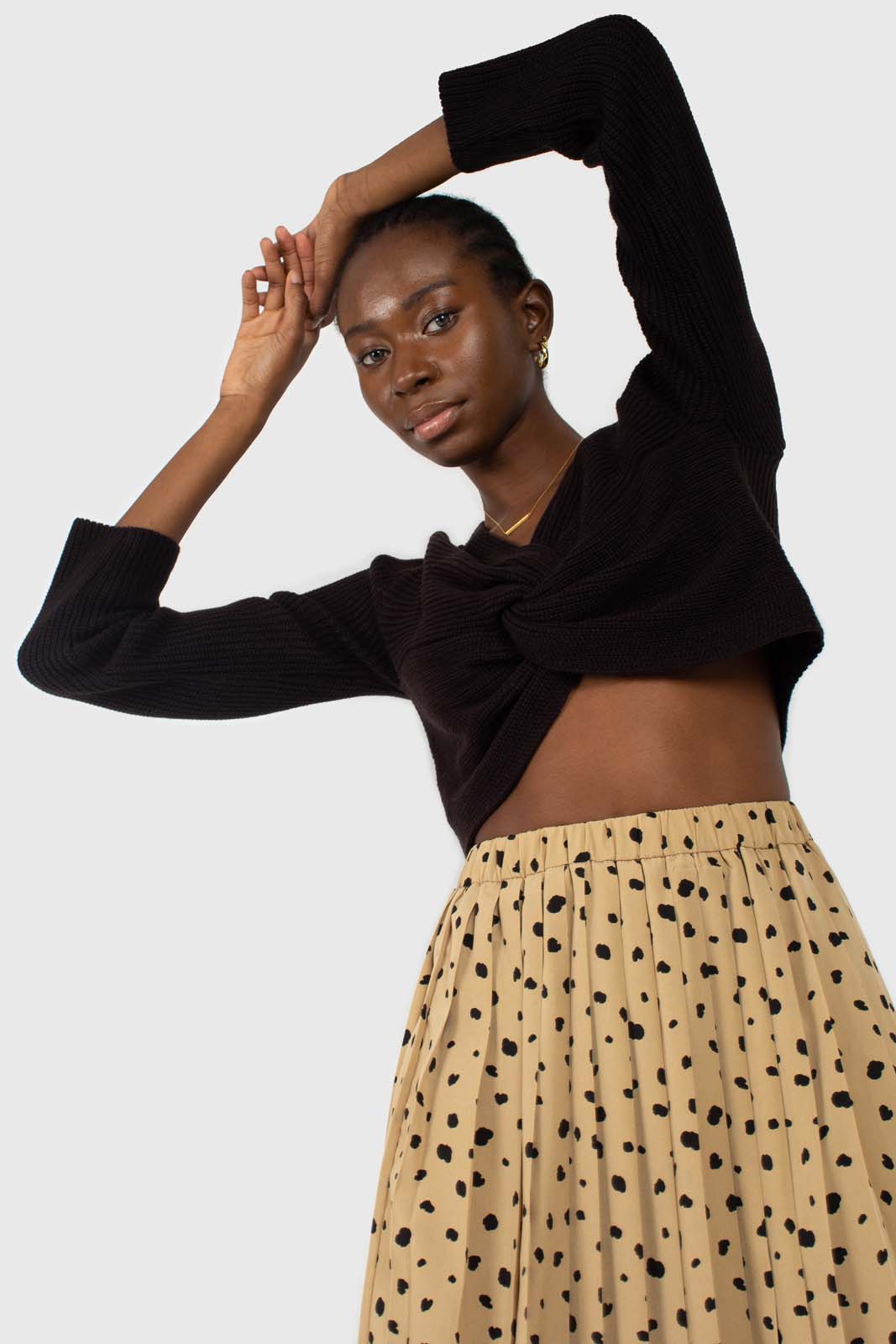 Beige and black leopard print pleated midi skirt