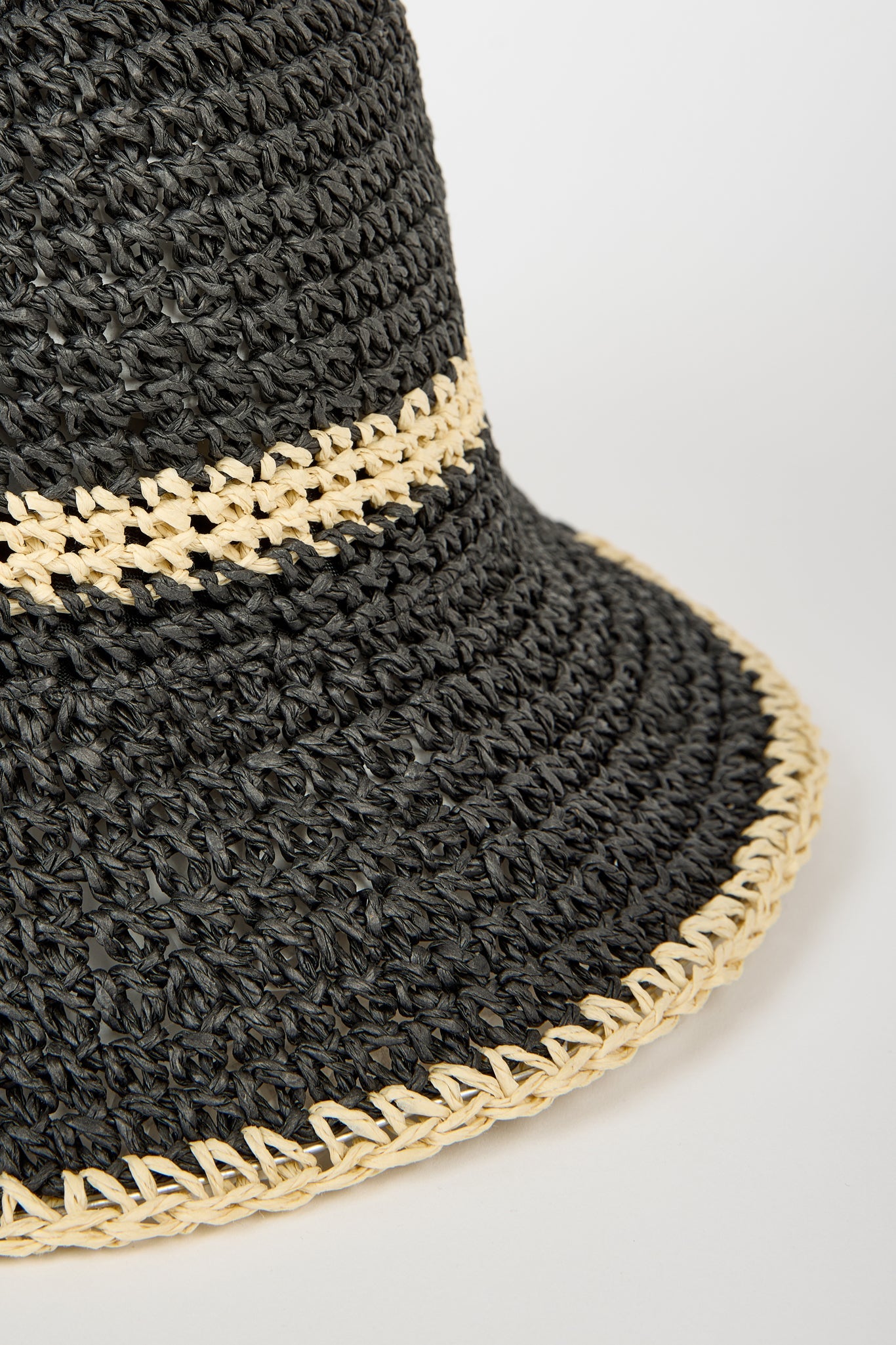 Black and beige woven trim straw hat