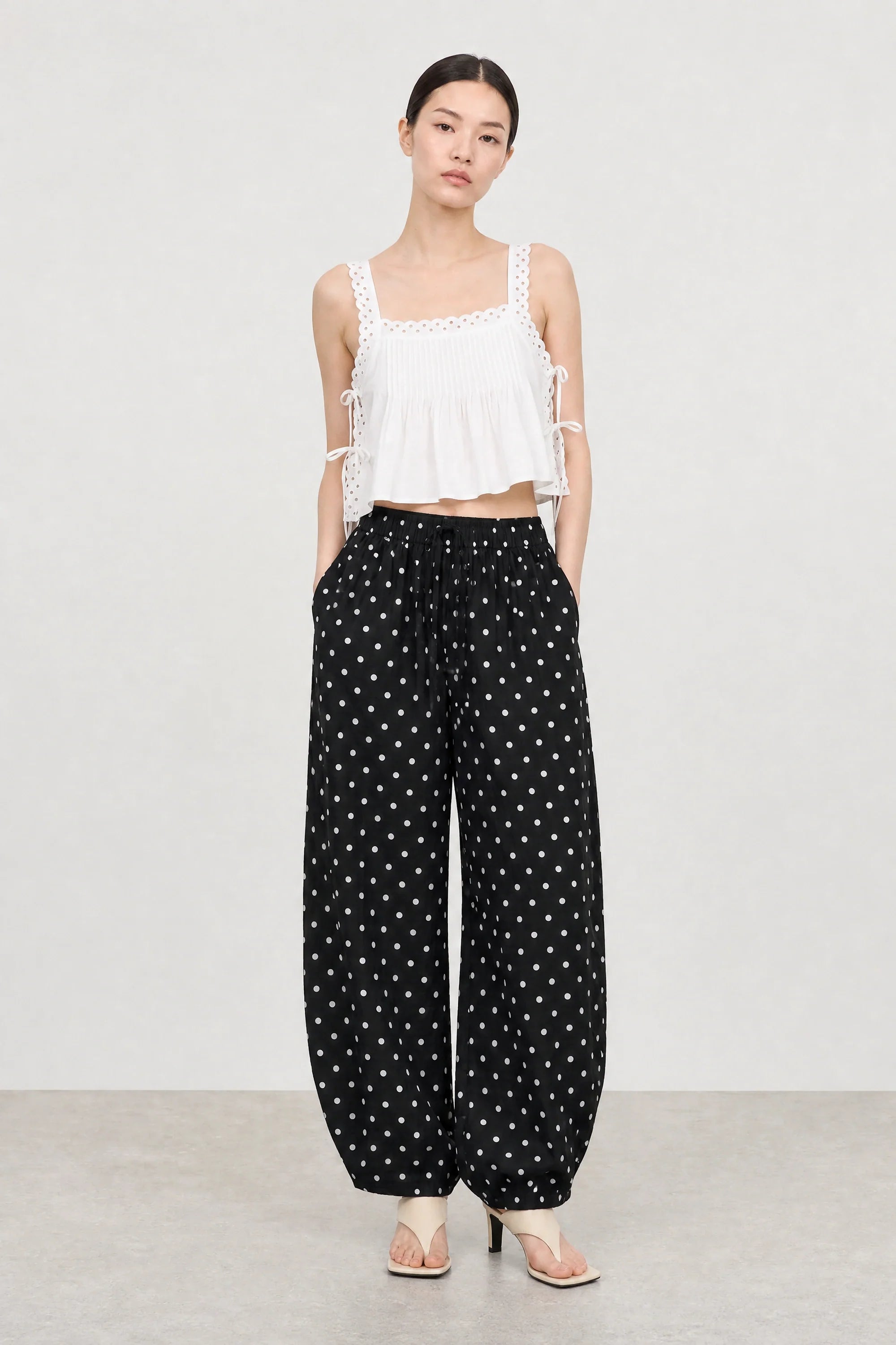 Black and white polka dot linen blend slouchy trousers
