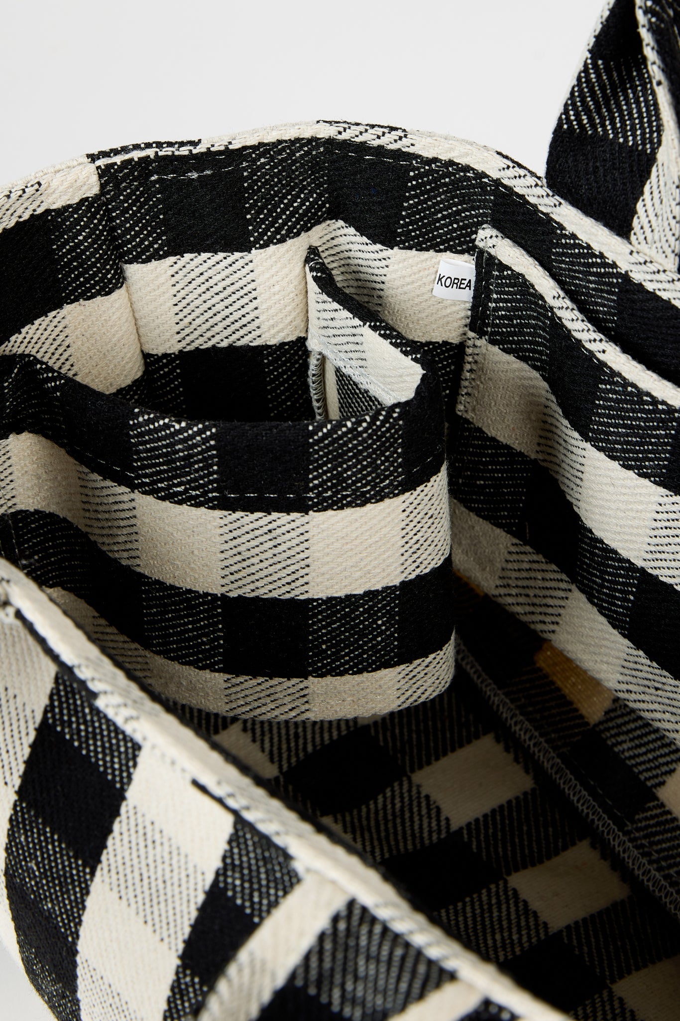 Black giant check mini tote bag