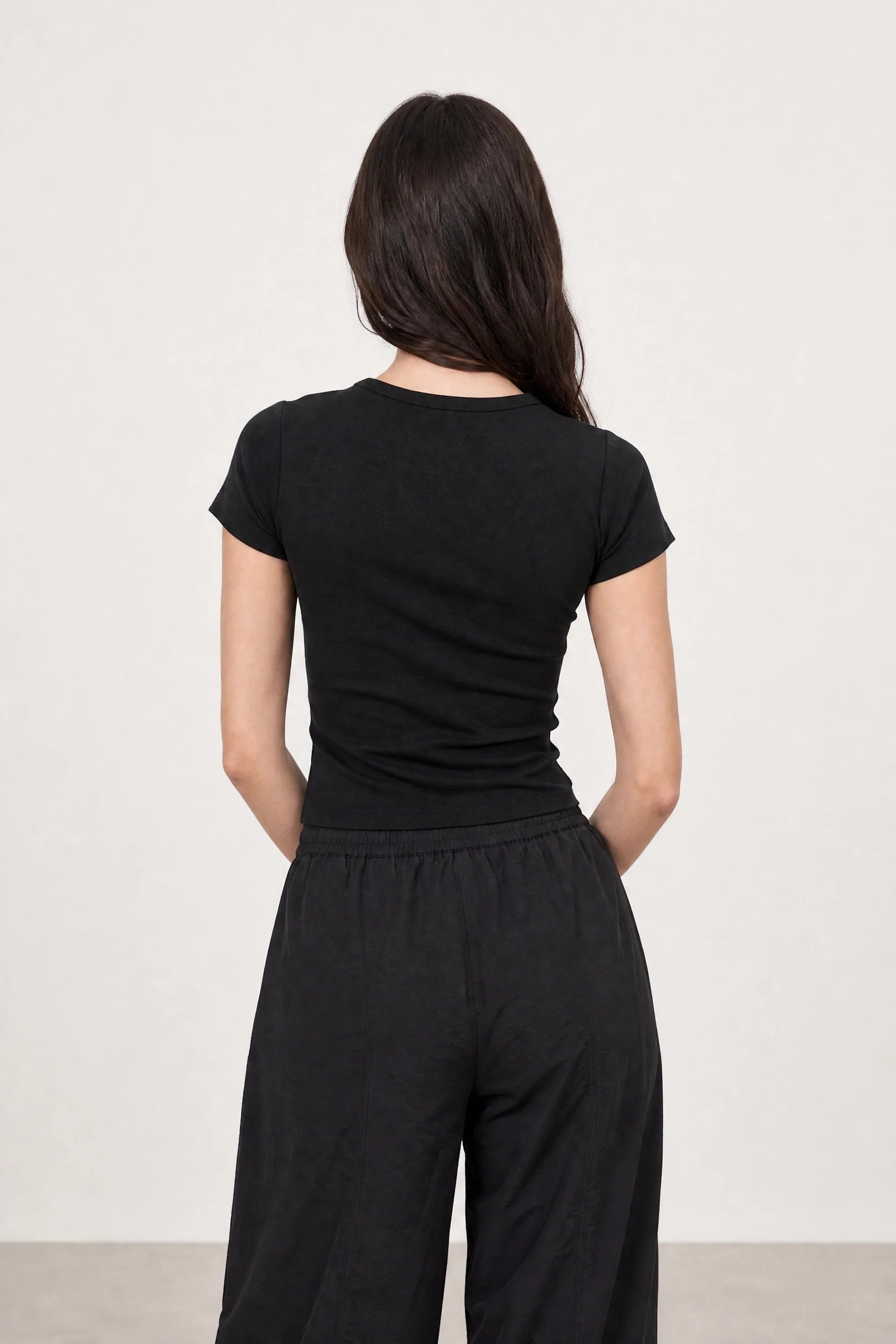 Black lightly padded fitted tee