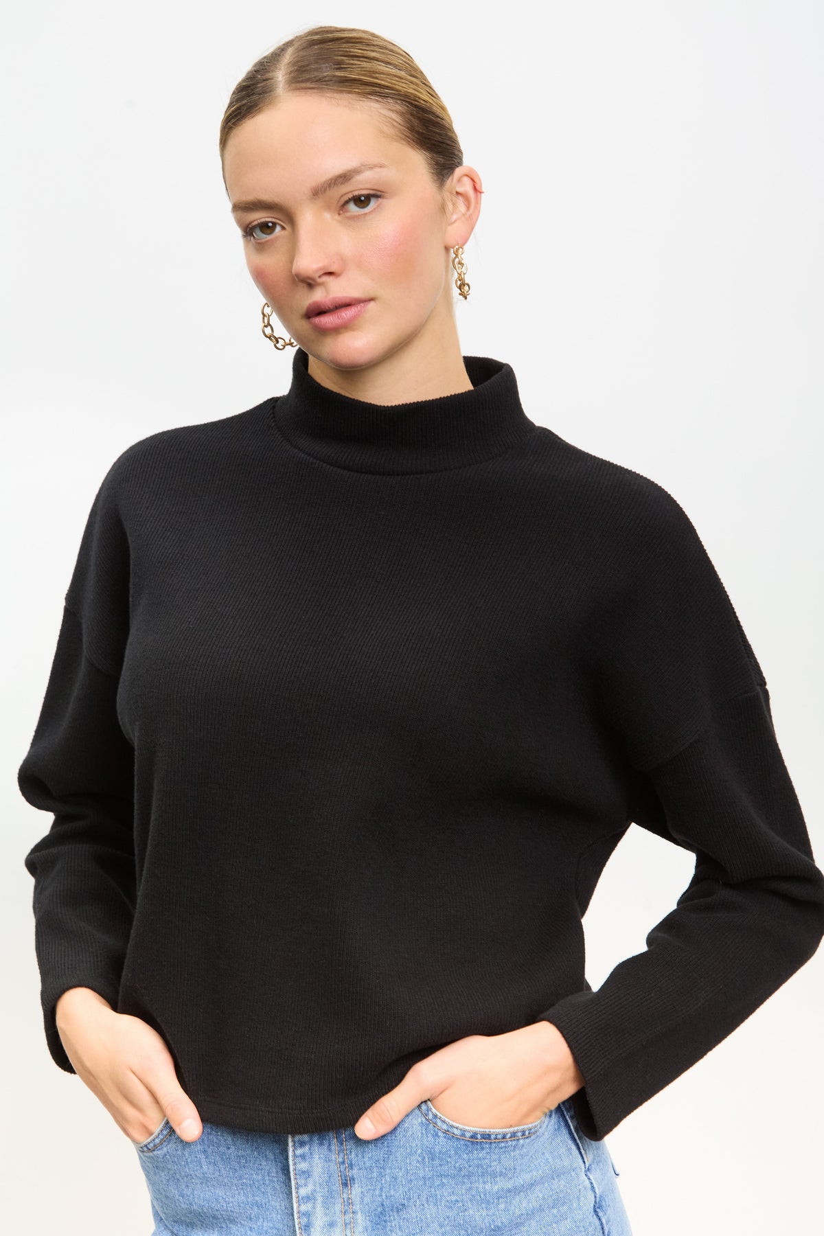 Black micro ribbed mock neck top