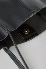 Black vegan leather pinched strap tote bag