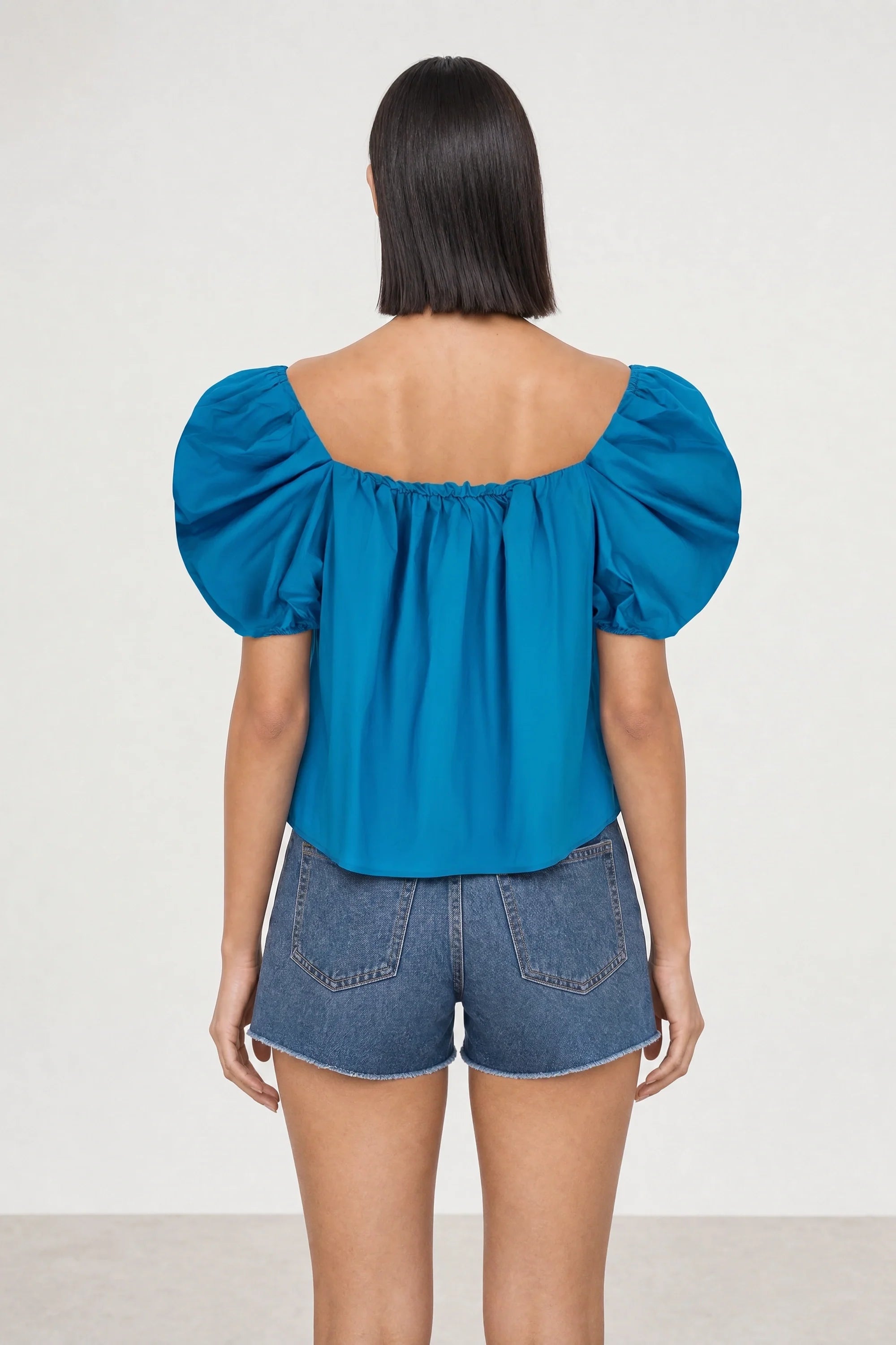 Bright blue puff sleeve blouse
