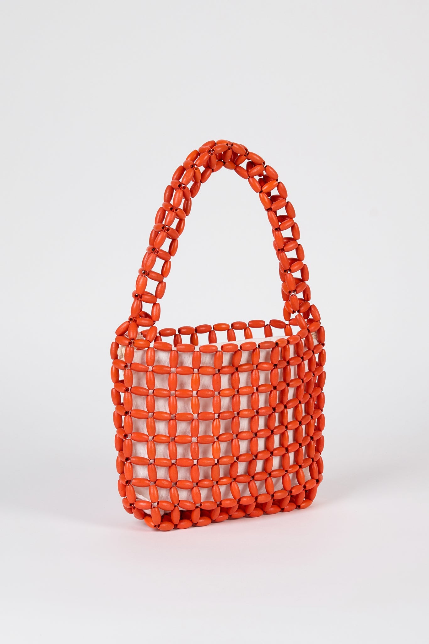 Bright orange wooden beaded mini shoulder bag