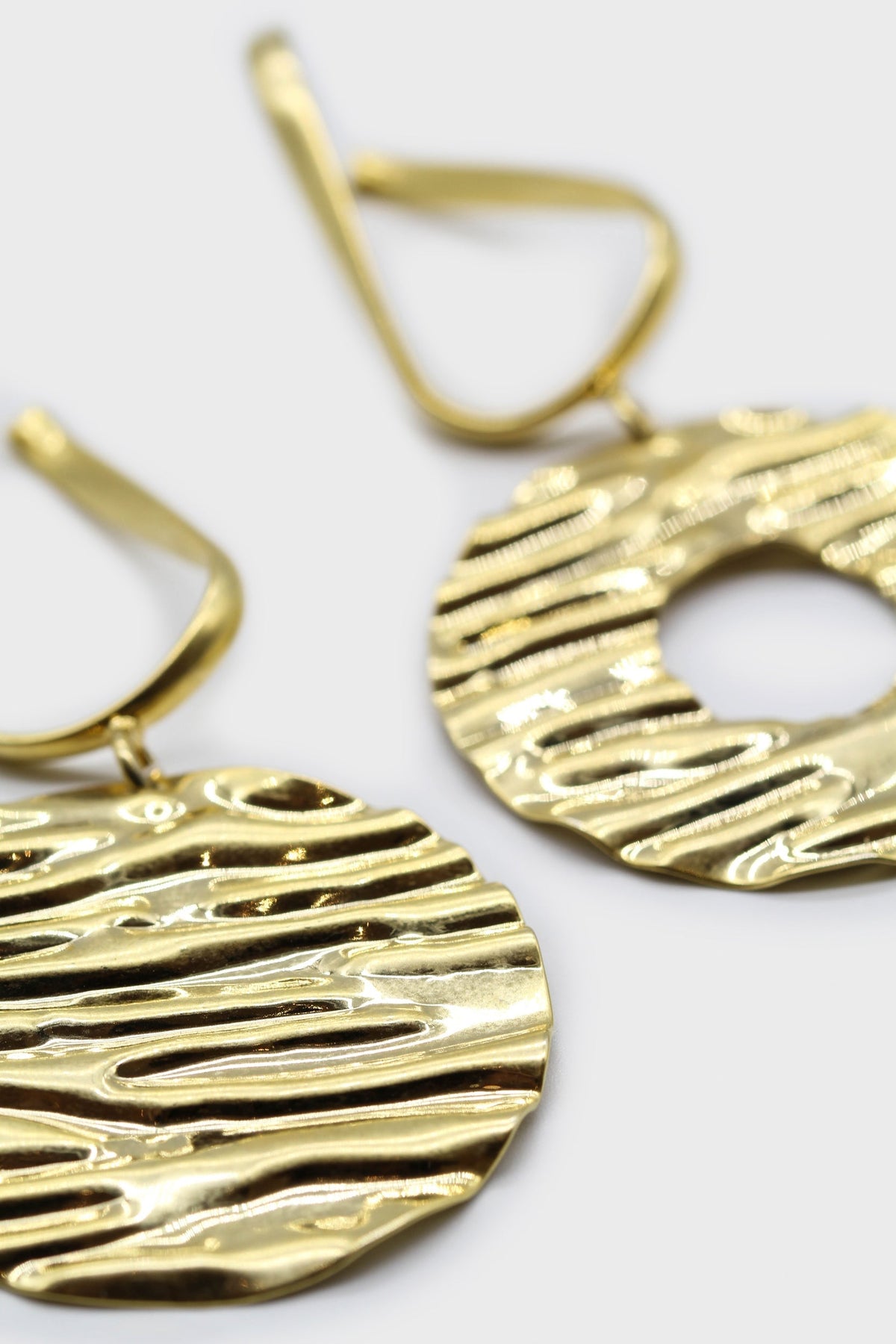 Gold large textured drop circle earrings