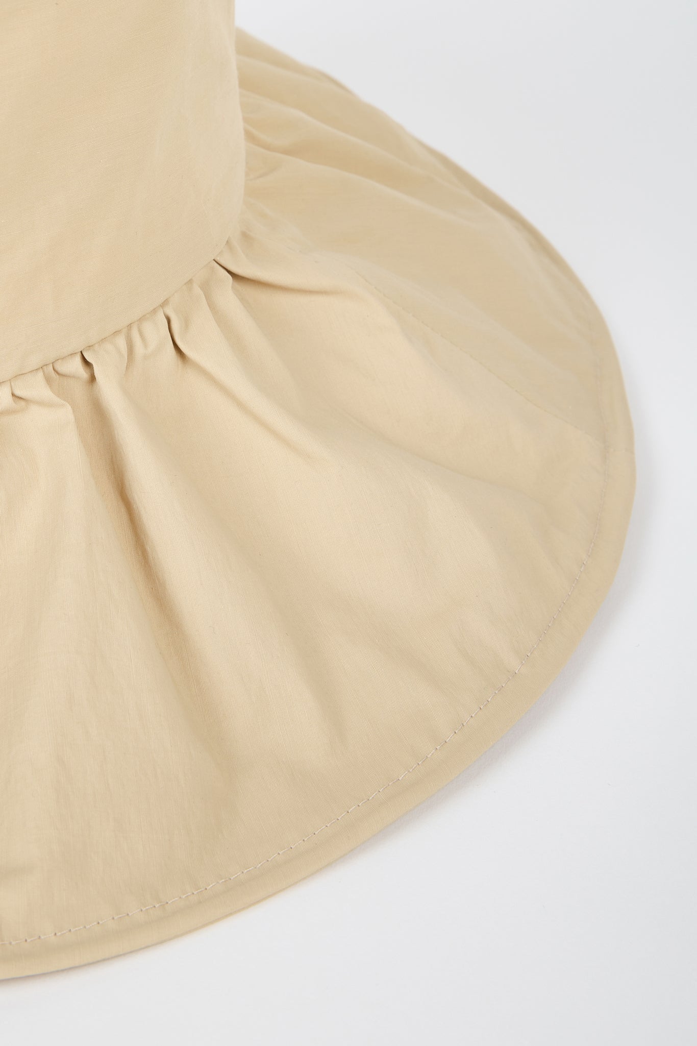Light beige ruched wide brim bucket hat