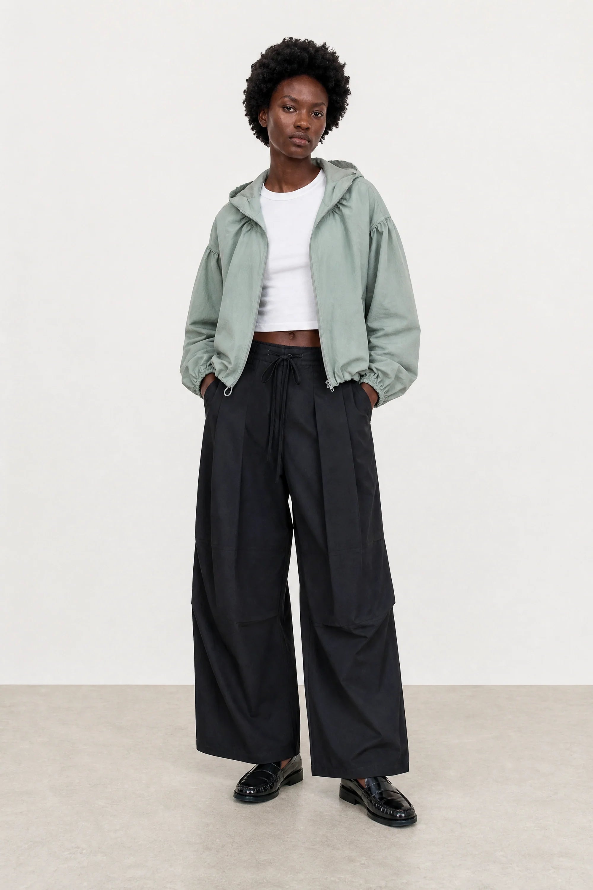 Light grey box textured hooded windbreaker