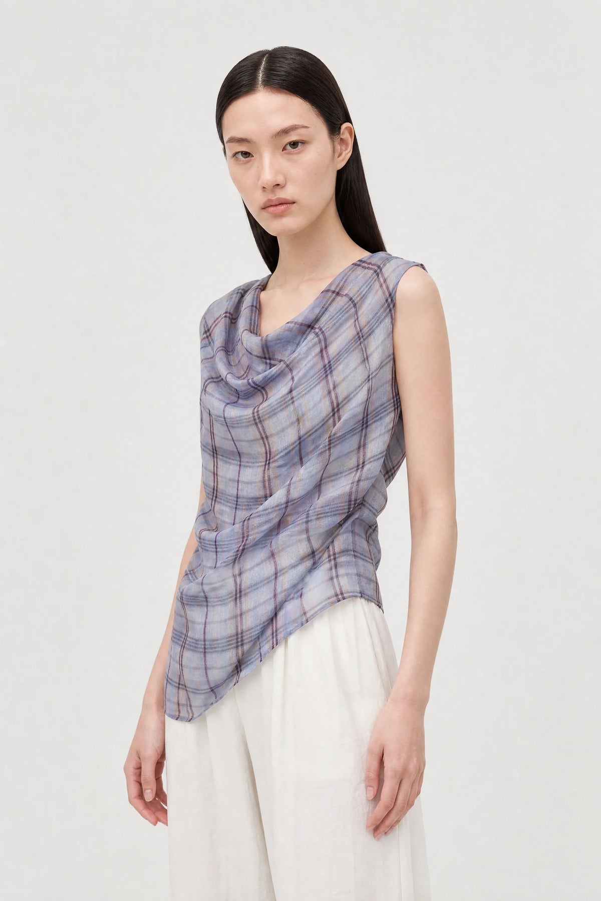 Lilac and yellow plaid asymmetric draped sleeveless blouse