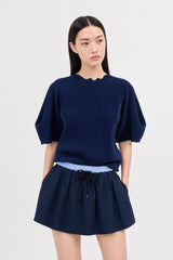 Navy blue ribbed mock neck blouson sleeve top