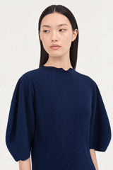 Navy blue ribbed mock neck blouson sleeve top