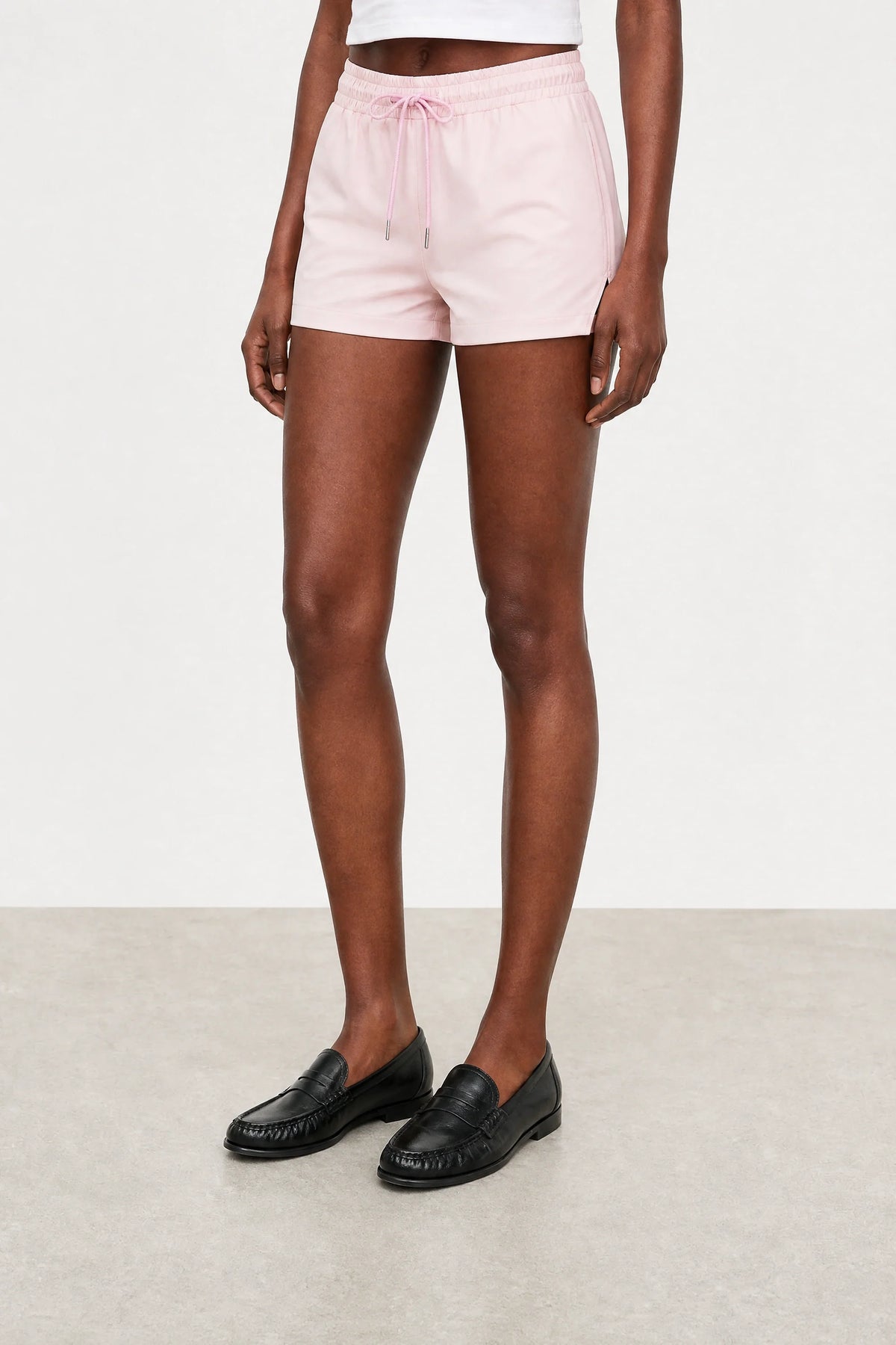 Pale pink vegan leather shorts