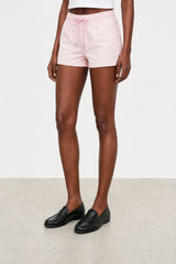 Pale pink vegan leather shorts