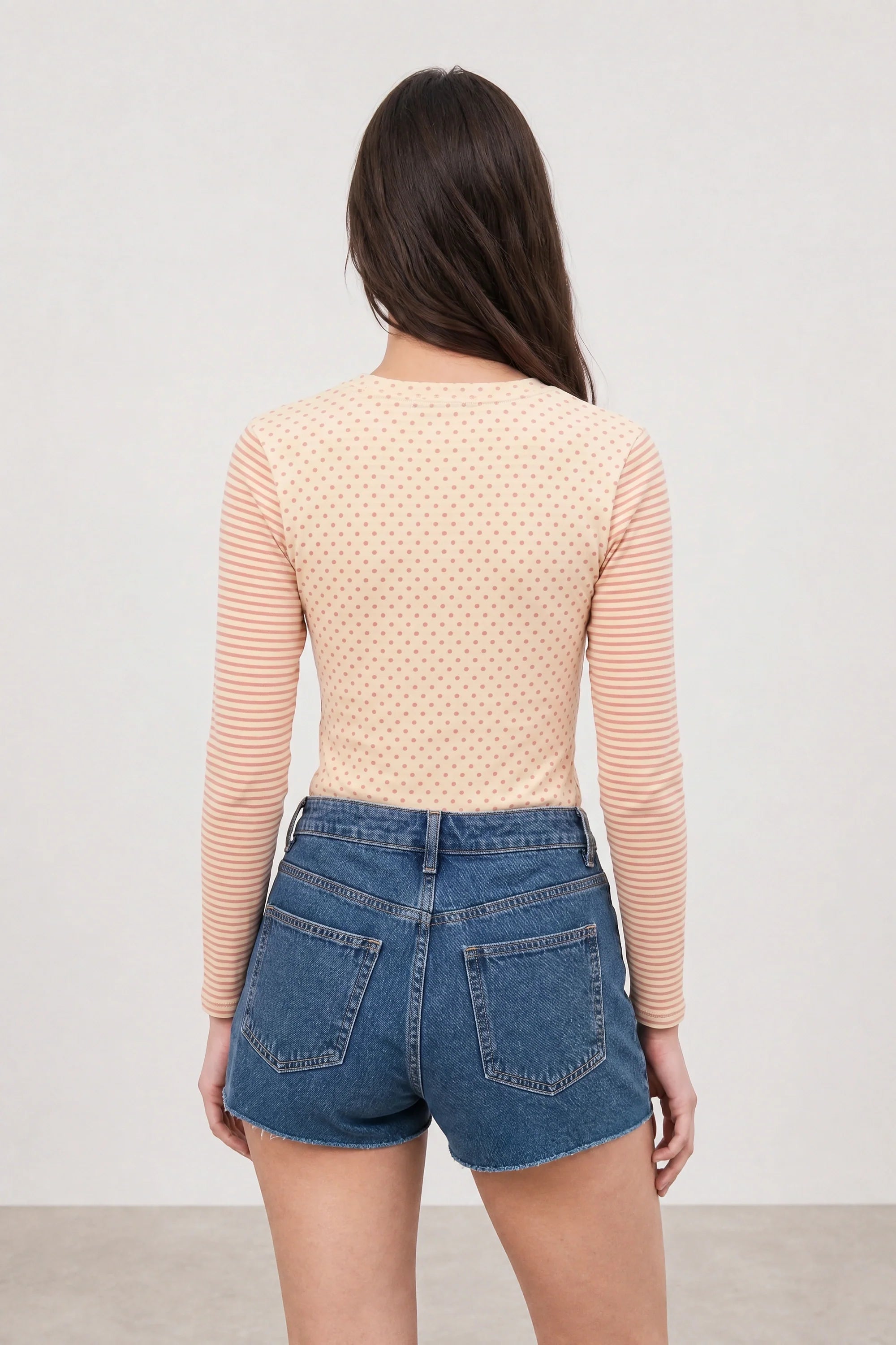 Pale yellow and pink polka dot striped long sleeved tee