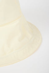 Pale yellow nylon wide brim bucket hat