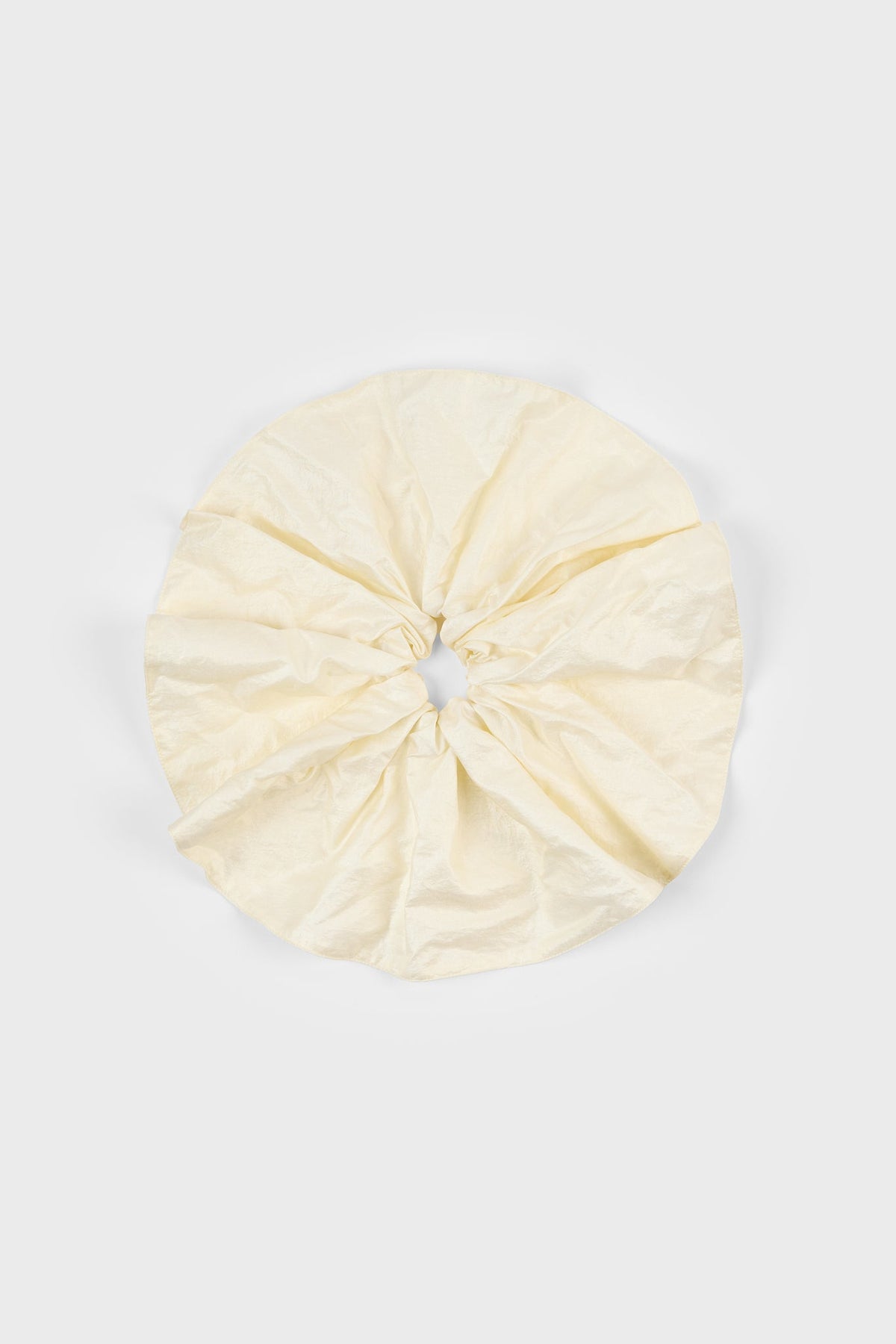 Pale yellow shimmery smooth scrunchie