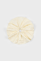 Pale yellow shimmery smooth scrunchie