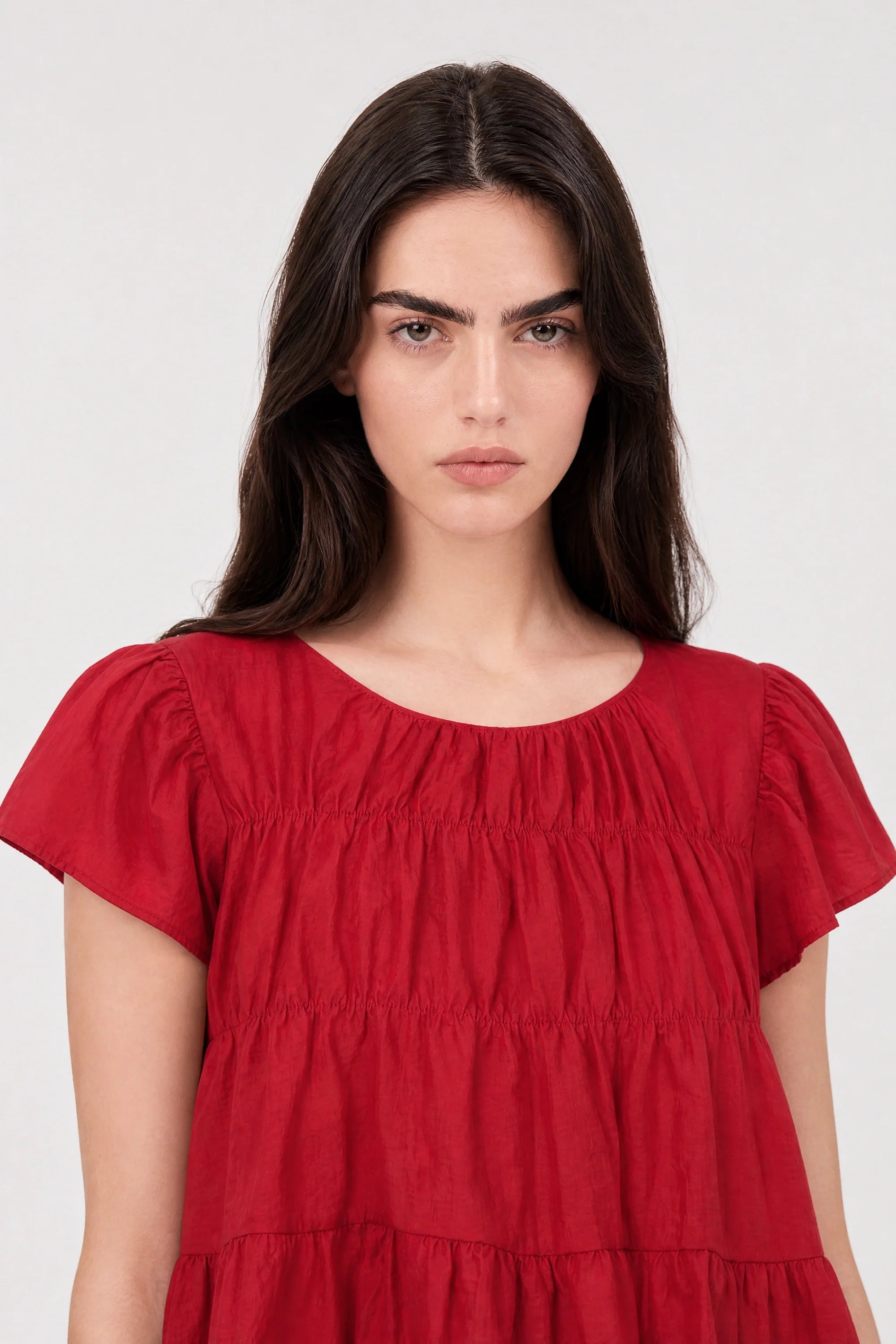 Red diagonal ruched short sleeve top