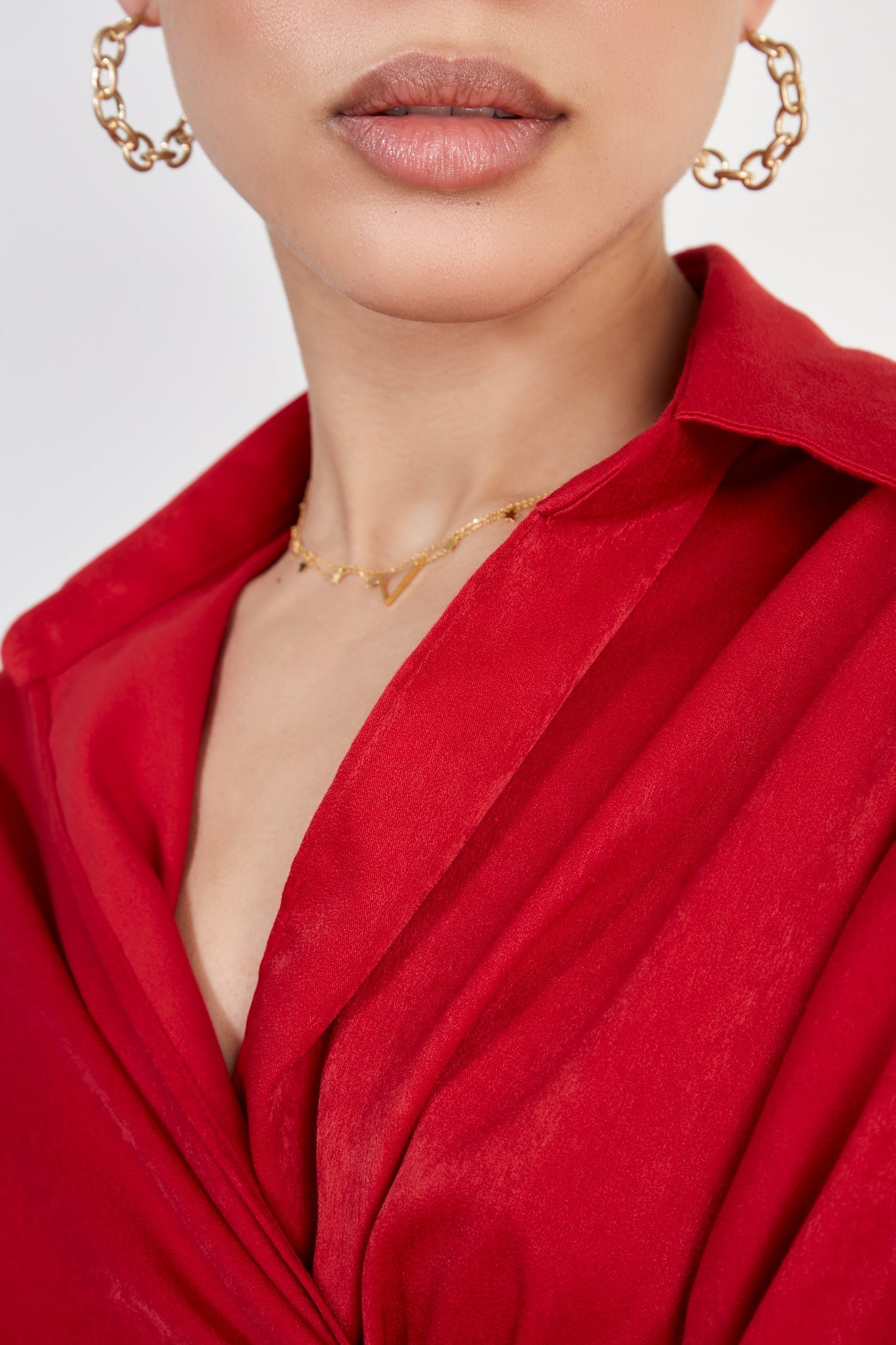 Red silky plunging tie front shirt