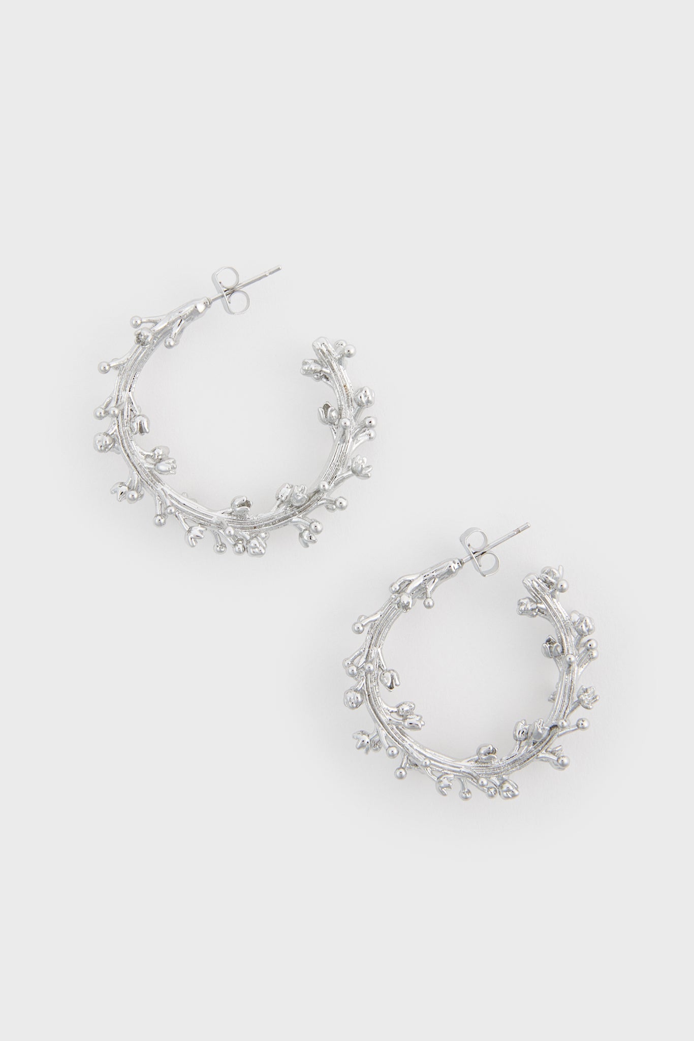 Silver branch hoop earrings