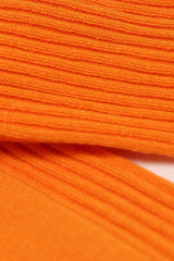 Bright orange long ribbed socks