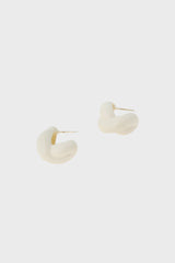 White enamel single twist earrings