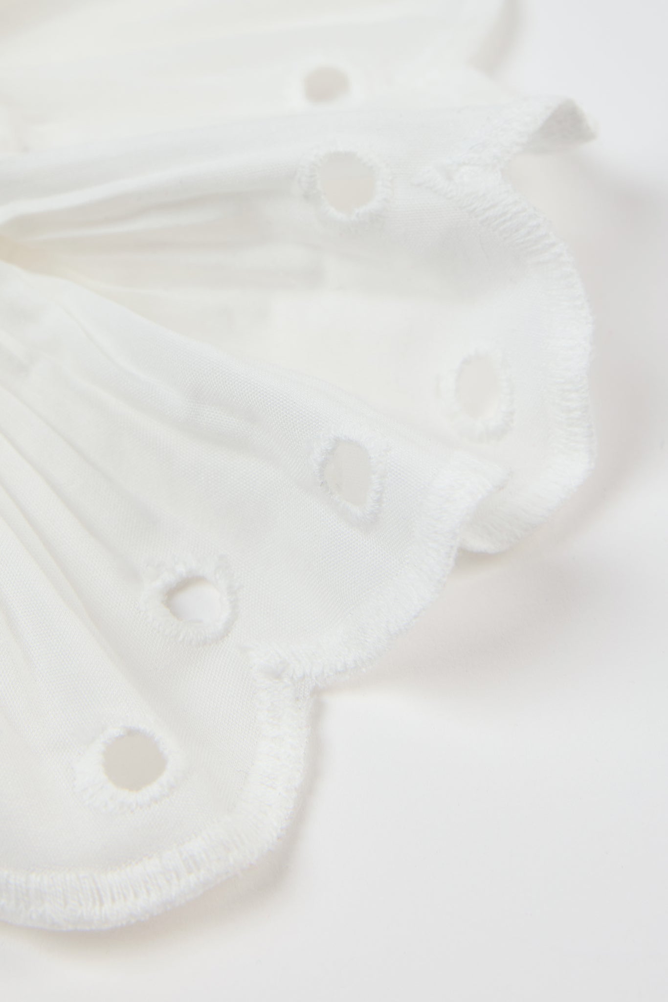 White eyelet wrist cuff scrunchie