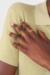 Gold interwoven strands ring